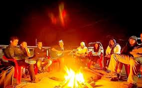 Bonfire under starry sky